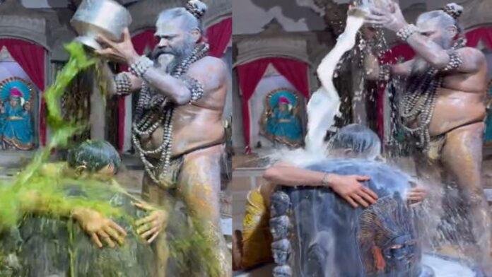 अनोखे अंदाज में लालू के बड़े लाल, शिवलिंग से लिपटकर कराया जलाभिषेक