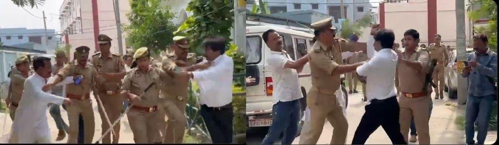 यूपी के लखीमपुर खीरी में भाजपा विधायक और अधिवक्ता में भिड़ंत को रोकते पुलिस वाले। 