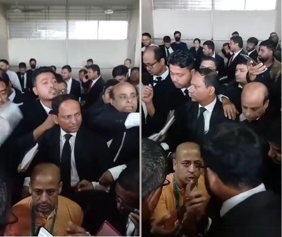 सुर्खियों में चिन्मय दास, उनकी रिहाई की मांग करने वालों पर बांग्लादेशी पुलिस ने जमकर बरसाईं लाठियां चटगांव के छठें मेट्रोपोलिटन मजिस्ट्रेट की अदालत में मंगलवार को पेशी के दौरान वकीलों के बीच संत चिन्मय दास।