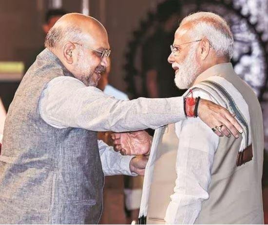 प्रधानमंत्री नरेंद्र मोदी संग केंद्रीय गृह मंत्री अमित शाह की फाइल फोटो
