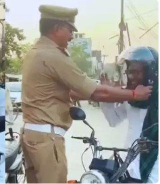 रोजेदार को यूपी के बलिया में दारोगा ने पहनाया हेलमेट तो सोशल मीडिया पर छाया वाकया बलिया बाजार में बिना हेलमेट के बाइक चलाते रोजेदार से ट्रैफिक दारोगा की वायरल वीडियो।