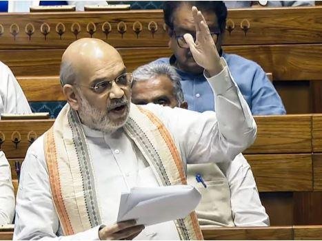 लोकसभा में बोलते अमित शाह
