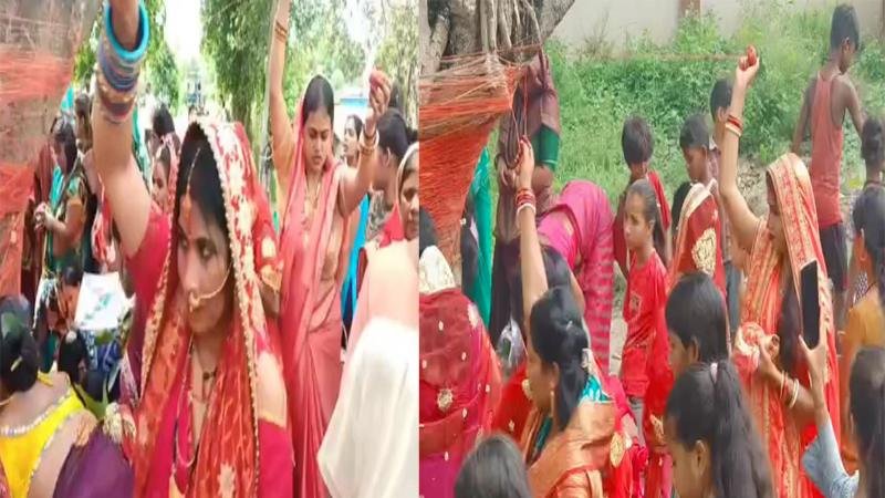 सुहागिन महिलाएं ने किया वट सावित्री पूजा, बरगद के पेड़ पर बांधा कच्चा सूत सुहागिन महिलाएं ने किया वट सावित्री पूजा, बरगद के पेड़ पर बांधा कच्चा सूत