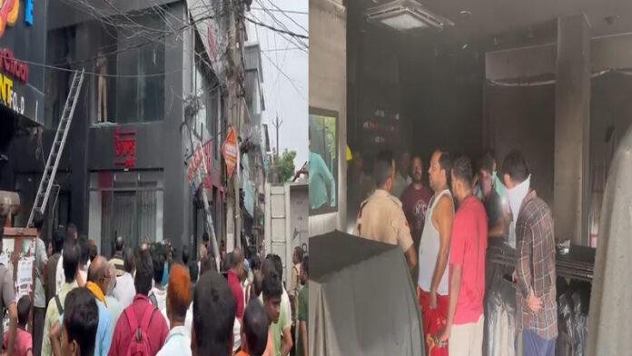शोरूम में लगी भयंकर आग, दुकानदारों में मची अफरा-तफरी