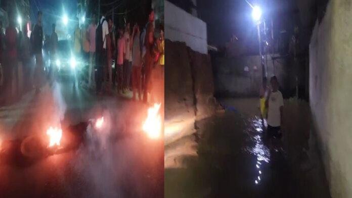 जलजमाव से त्रस्त लोगों ने किया आगजनी और सड़क जाम
