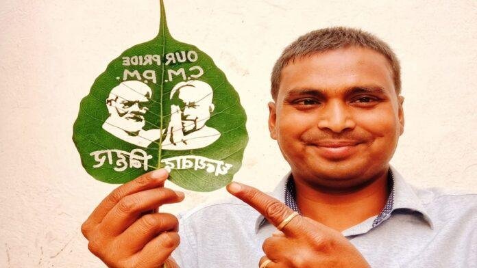 विधानसभा चुनाव में एनडीए की बंपर जीत पर सैंड आर्टिस्ट ने दी बधाई, पीपल के पत्ते पर लिखा संदेश