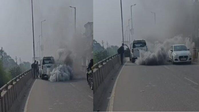 चलती स्कॉर्पियो में आग लगने से मची अफरातफरी, जानमाल का नुकसान नहीं