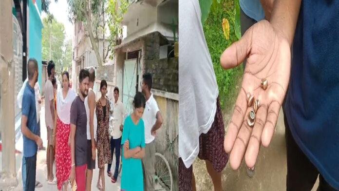 गोलियों की गूंज से दहशत, घरों की खिड़कियां टूटीं, मोहल्ले में मची अफरा-तफरी